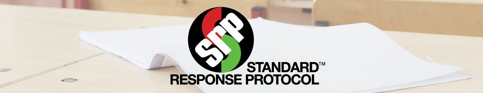 Standard Response Protocol (SRP) logo with a journal on top of a desk as the background